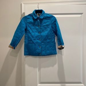 Aqua blue Burberry coat. Size 10 in good condition.
